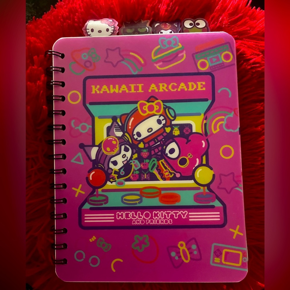 Sanrio Hello Kitty spiral journal with grid pages and four tabs